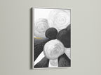 Modern abstract geometric art is beautifully showcased in a white frame. The black and white circle artwork offers a minimalist touch. This piece enhances modern and Scandinavian interiors. This artwork is versatile for any room.