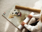 A woman carefully rolls a fine art poster paper featuring a golden retriever puppy. This Asian-style dog artwork is perfect for creating custom wall decor. The fine art paper ensures high-quality prints. Ideal for those seeking unique pet art prints for their home or studio.