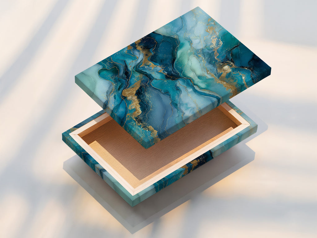 This is a stretched canvas print featuring abstract ocean artwork. Teal and gold colors blend seamlessly creating a modern masterpiece. Perfect for adding a touch of coastal elegance to any space. Enhance your home decor with this stylish fluid art poster.