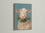 Framed whimsical sheep artwork with a floral crown and pearl necklace. This Country Wall Art is displayed in an oak frame. Perfect Farm Animal Print for Nursery Wall Decor. The oak frame enhances the vintage portrait's charm.
