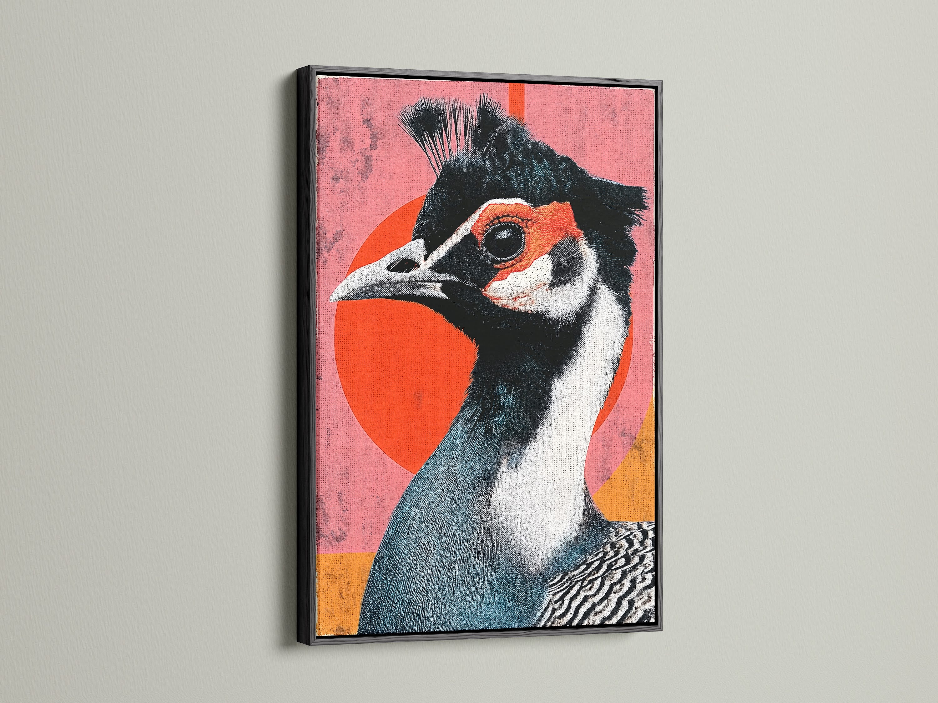 Exotic Bird art in a black frame adds a touch of sophistication. The artwork features a bird with teal and white feathers. A red circle is behind the bird. This animal art print complements modern eclectic or artistic styles. Perfect for wall decor.