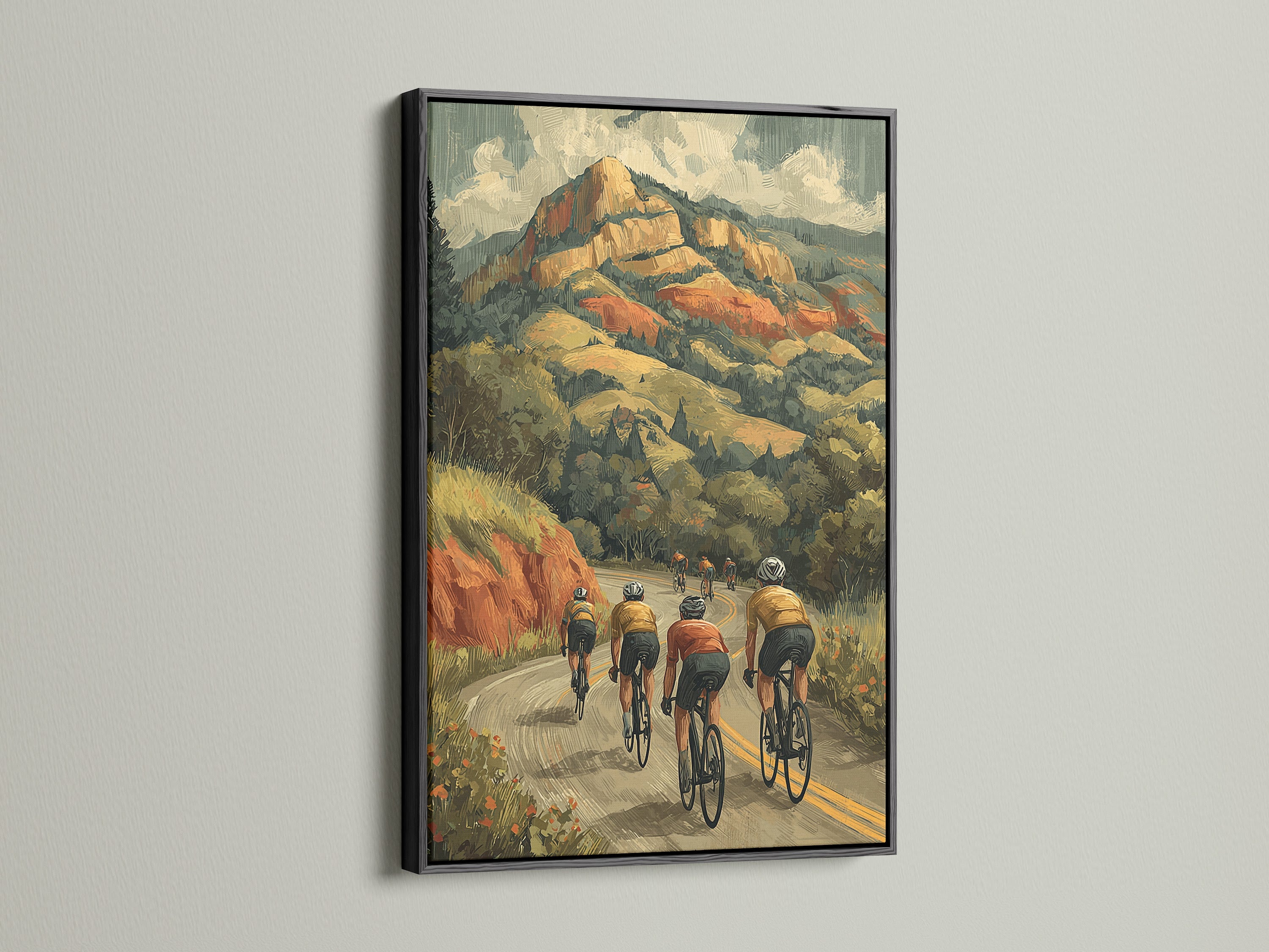 Cycling wall art with a black frame. The artwork depicts cyclists ascending a mountain road. A vintage sports art piece that brings sophistication to your space. Perfect for a home office wall art. Explore our bike canvas prints