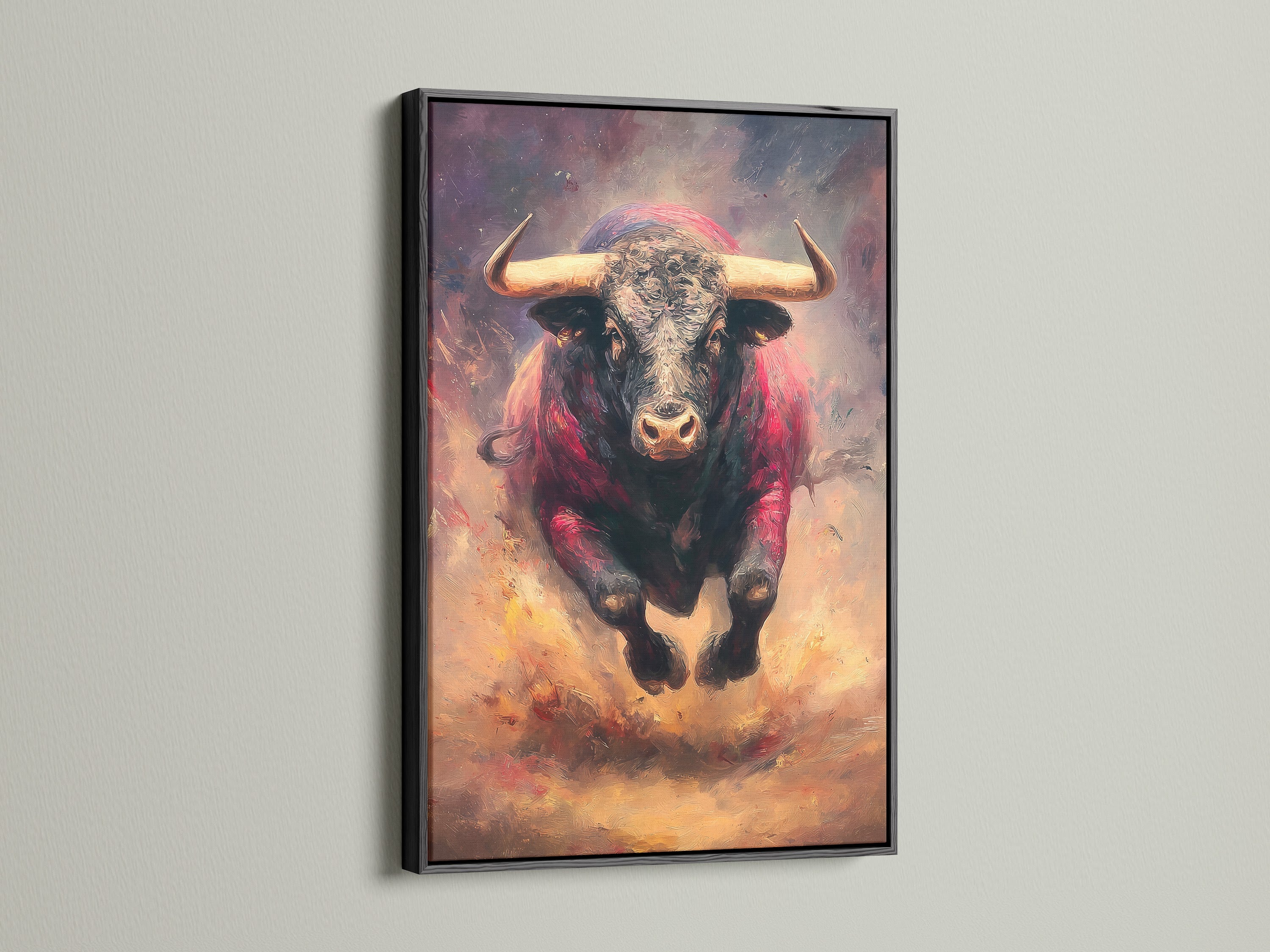 A bold bull artwork is encased in a black frame. The artwork makes a statement in any setting. The black frame adds a touch of sophistication. See how framed art can enhance your home decor today.