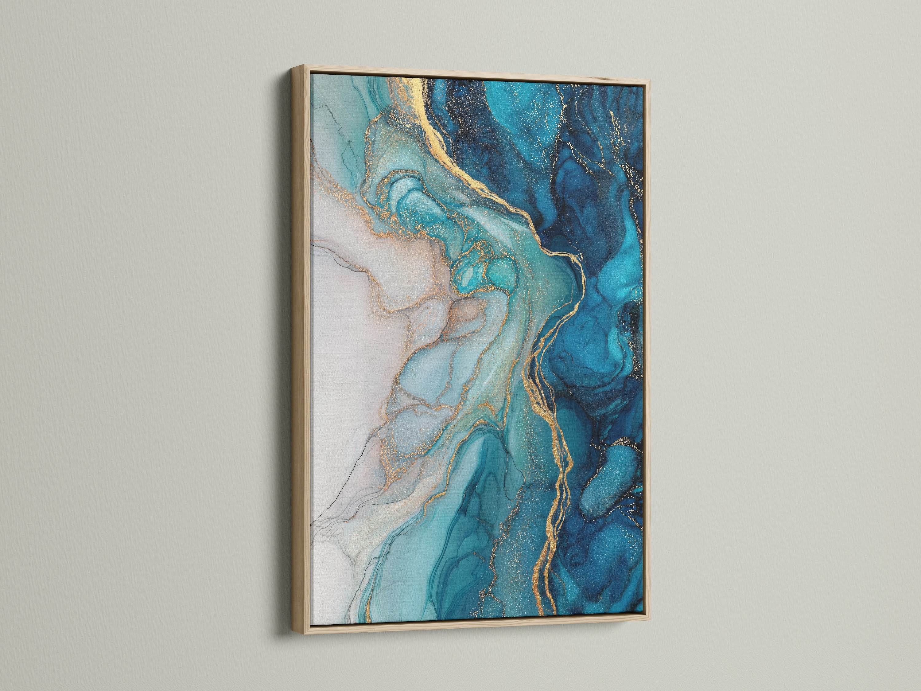 This oak frame showcases stunning blue abstract art. The fluid acrylic wall art features mesmerizing teal and gold marble patterns. It's an ideal piece for modern bedroom decor. The artwork brings a touch of contemporary style to any room with its unique fluid painting technique.