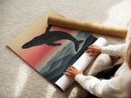 A woman is rolling a fine art poster paper. This paper is used for whale art and mountain prints. The nature canvas is perfect for creating landscape art. It can be used for minimalist art and bedroom decor.
