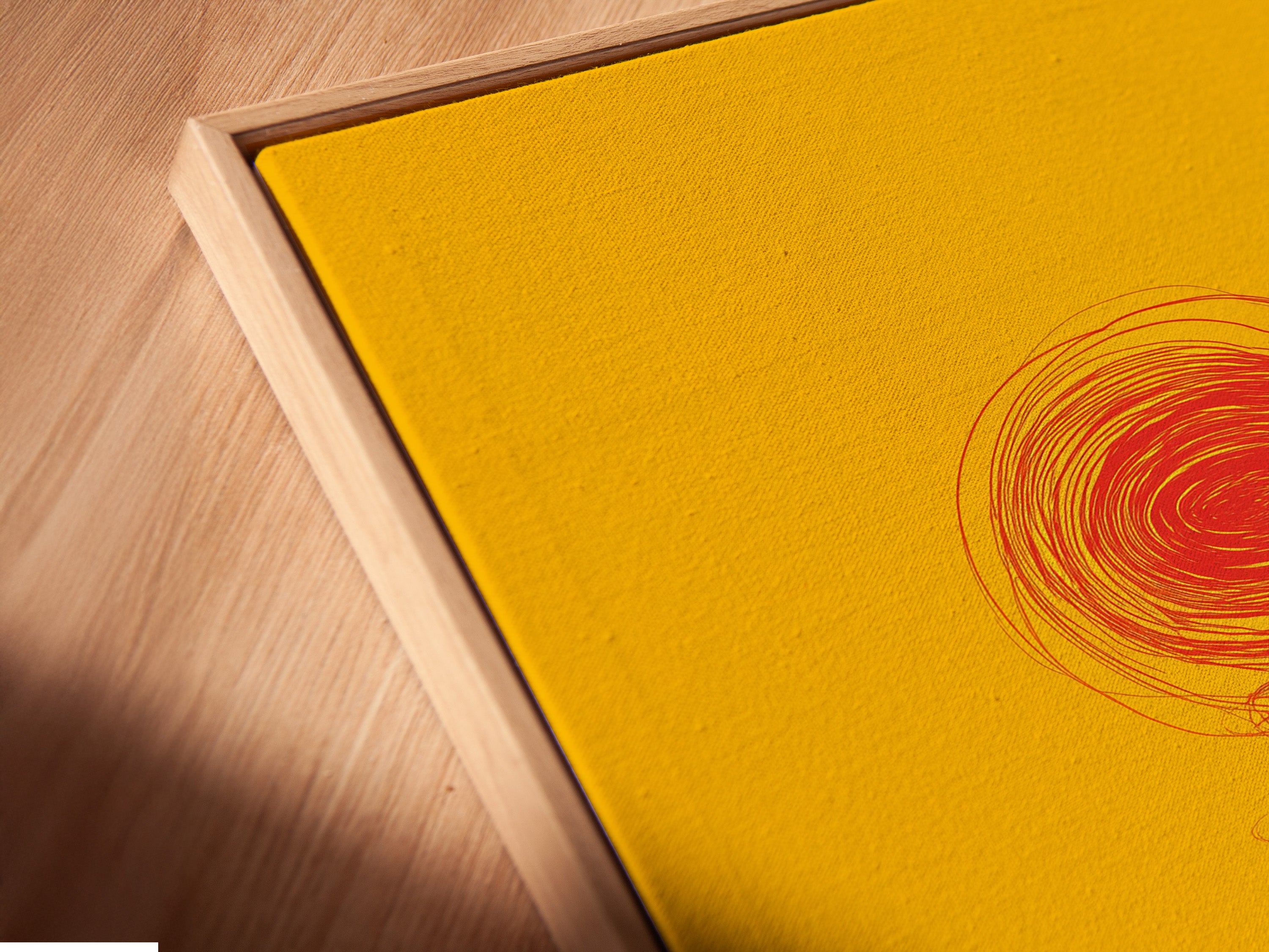 A close-up shows a canvas print in a floating frame. The floating frame gives the artwork depth. It provides a modern gallery-like feel. The canvas print appears to float within the frame. This is a unique way to display your art.