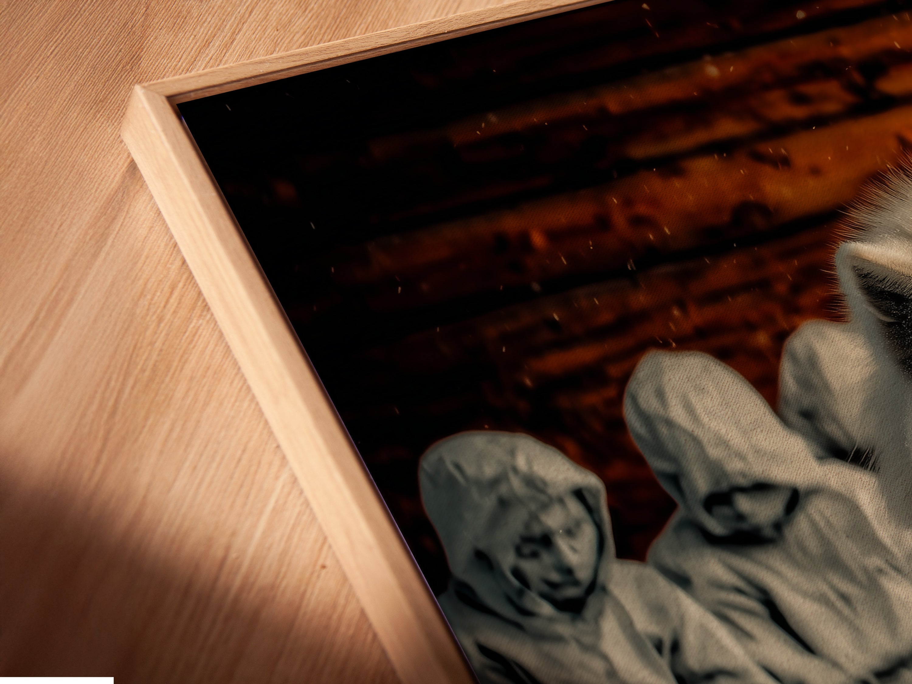 A close-up angled view highlights a canvas print of a white wolf in a floating frame. The fine details and textures of the artwork are emphasized. Perfect for adding a sophisticated rustic touch to your home decor.