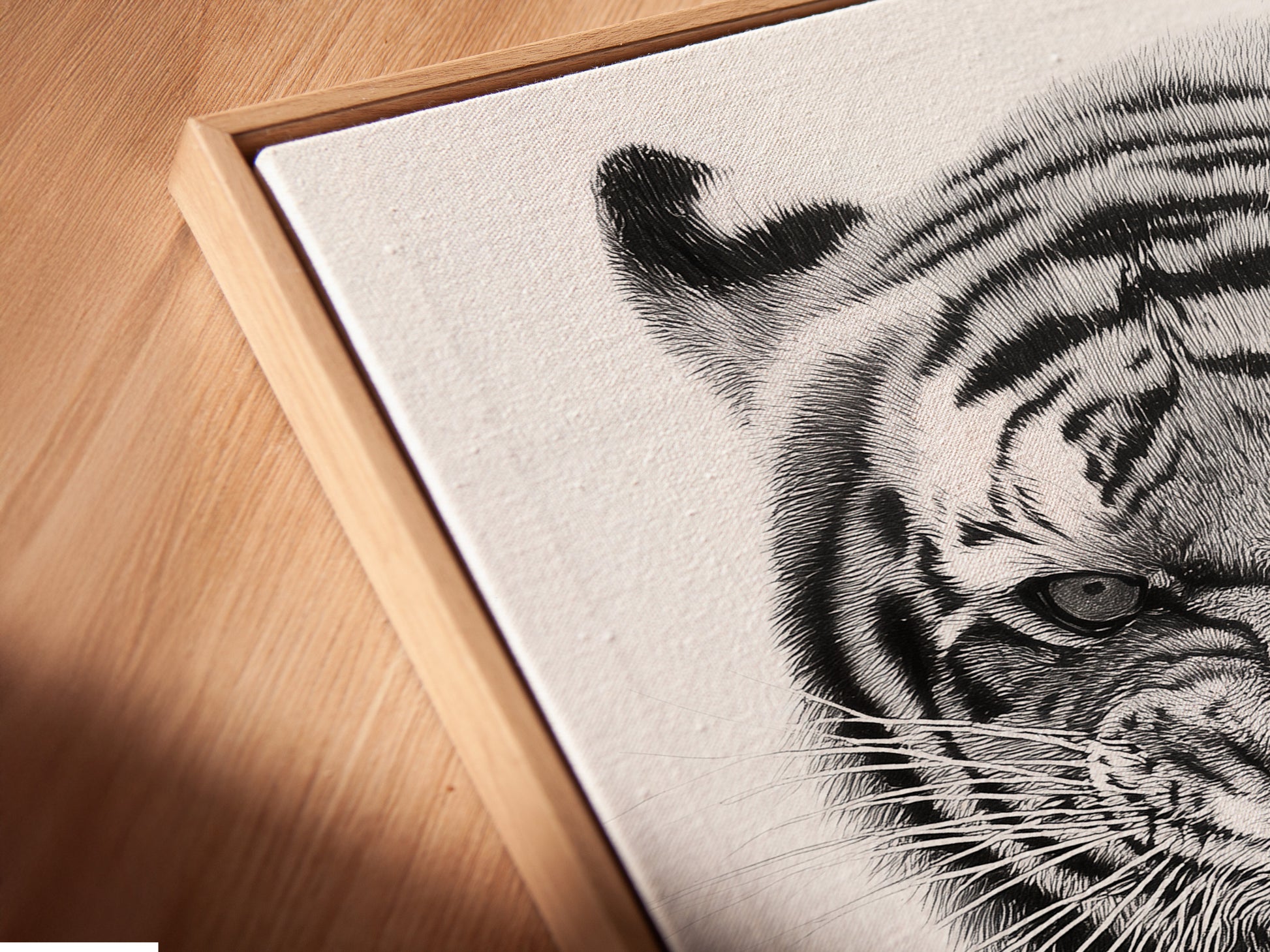 This is an angled close up of a canvas print in a floating frame. The floating frame enhances the artwork. It gives it a modern and gallery like feel. This framing option is perfect for showcasing detailed art. It adds depth and dimension to any piece.