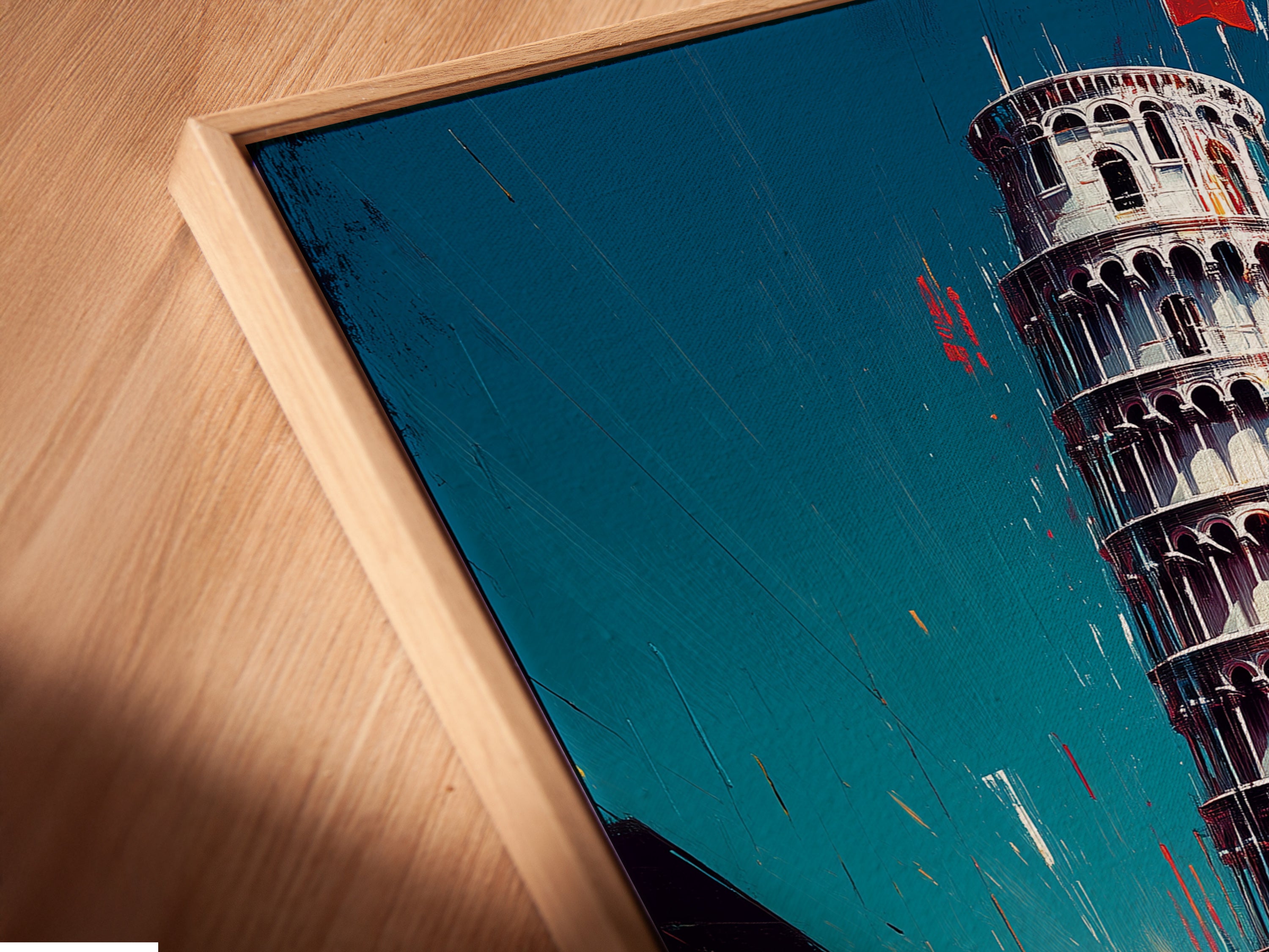 Angled close up of a Leaning Tower of Pisa canvas print. This artwork is displayed in a floating frame. See the texture and detail of this modern travel art piece. Its unique presentation enhances any office wall art or study room setting