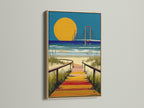 The beach boardwalk canvas print features an oak frame. It enhances the coastal sunset wall art. This ocean bridge landscape adds a touch of seaside wall art to beach house decor. Perfect for nautical decor.