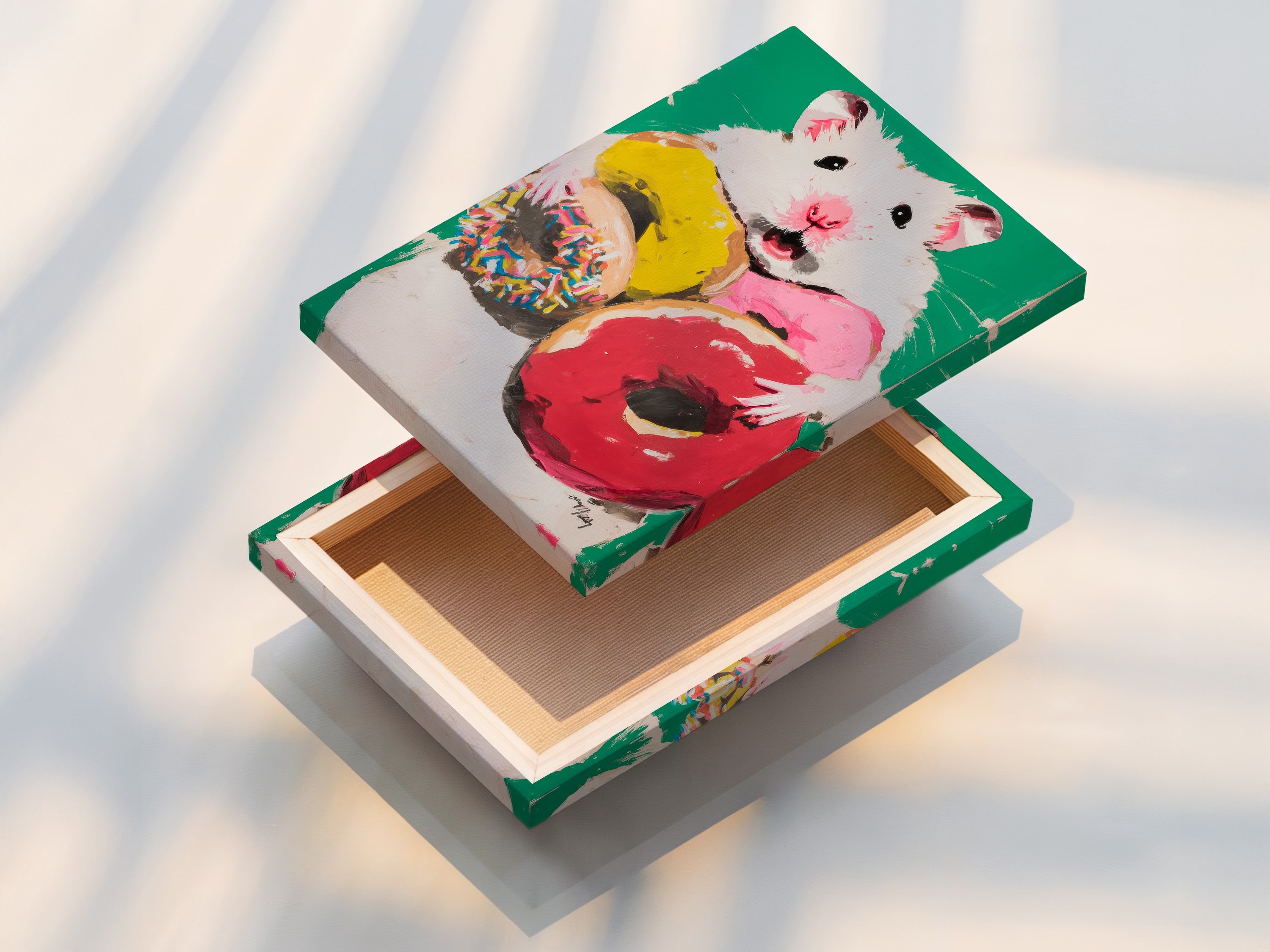 Stretched canvas print of the hamster donut artwork. This fun animal art is ready to hang. It is perfect for kids room decor. The colorful canvas artwork brings a playful touch to any room.