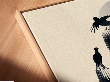 Angled close-up of a Cactus Birds canvas print in a floating frame. The desert silhouette artwork enhances your living space. A minimalist monochrome print featuring birds and a cactus. Perfect for southwestern decor.