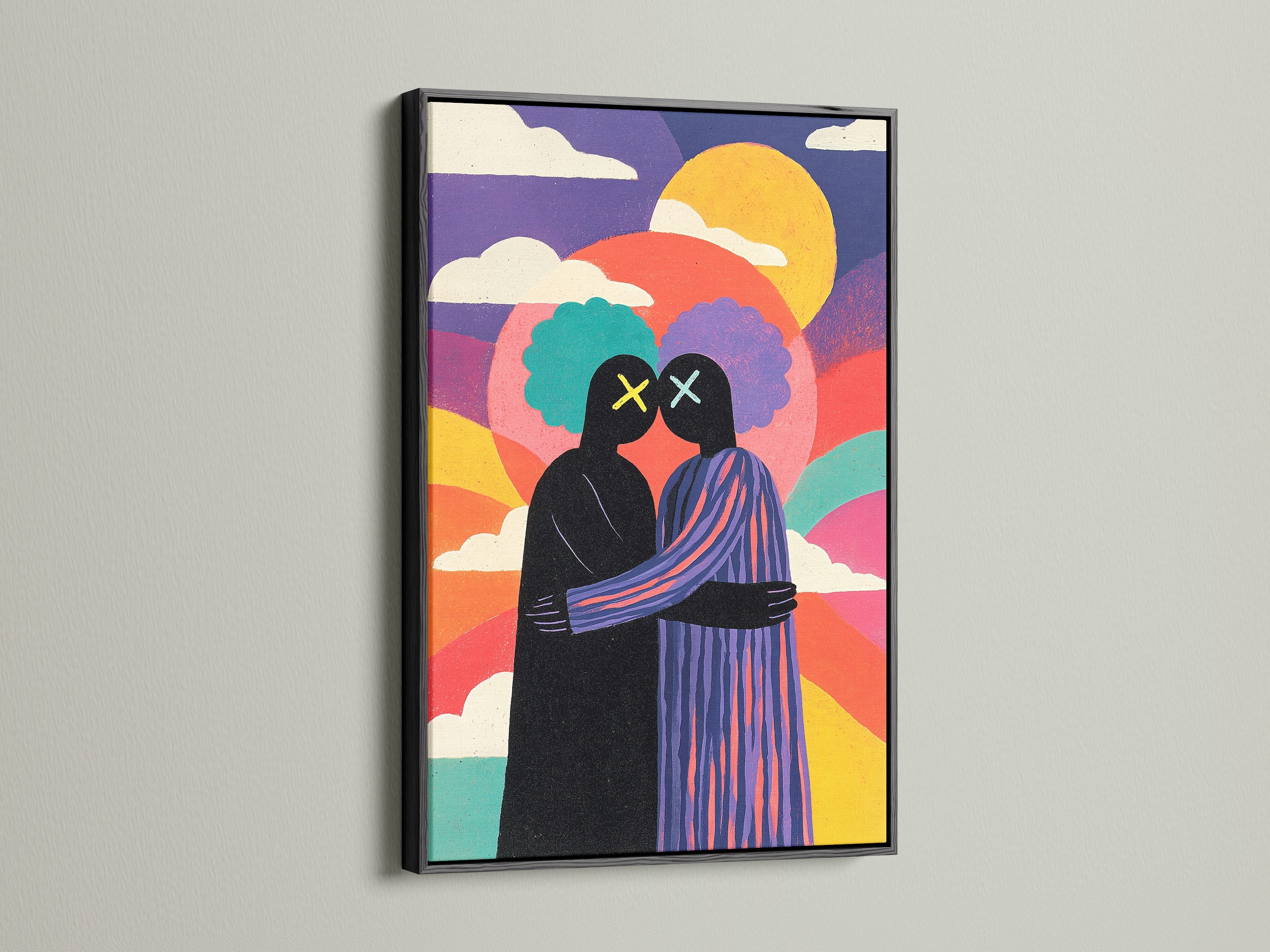 Framed artwork featuring two figures embracing. The art print has a black frame. The artwork is colorful with a rainbow effect. This wall art adds a modern touch to any space. Explore framed art options.