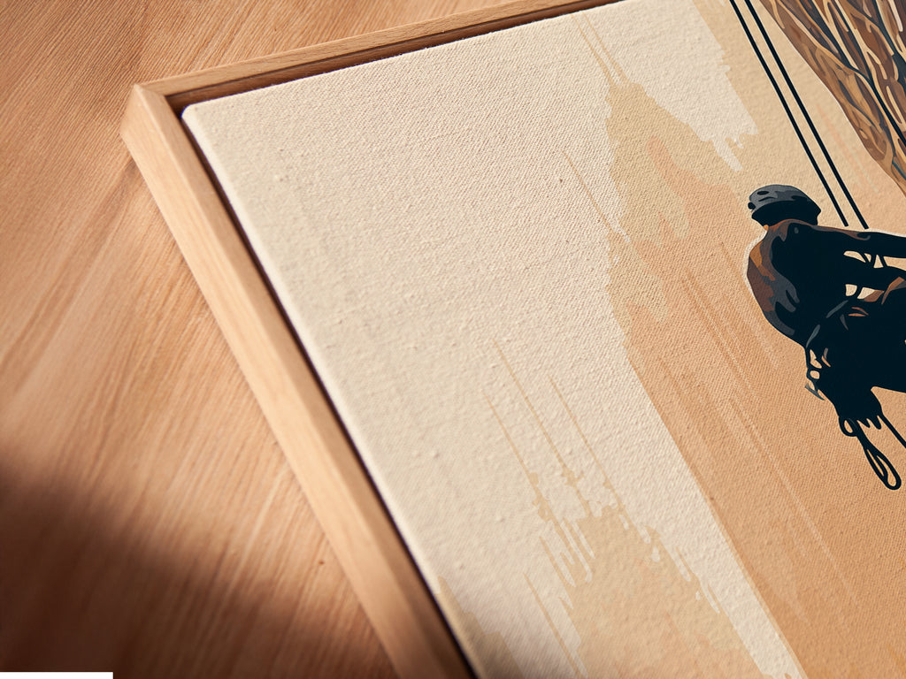 A close-up of the canvas print in a floating frame. The floating frame gives a modern look. The rock climbing artwork is ready to hang. This adventure wall decor is unique.