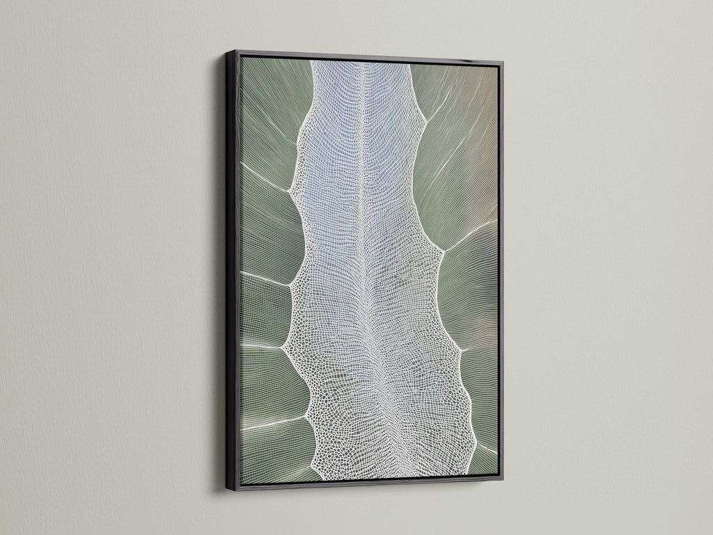 A black frame features modern botanical artwork. The artwork displays a sage green color. The wall art enhances living rooms bedrooms and offices. The art is perfect for wellness spaces.
