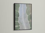 A black frame features modern botanical artwork. The artwork displays a sage green color. The wall art enhances living rooms bedrooms and offices. The art is perfect for wellness spaces.