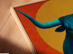 Get a detailed view of a canvas print in a floating frame. This artwork showcases the modern appeal of a teal bull print. Perfect for adding a touch of southwestern art to your home. The floating frame enhances the artwork's contemporary style.