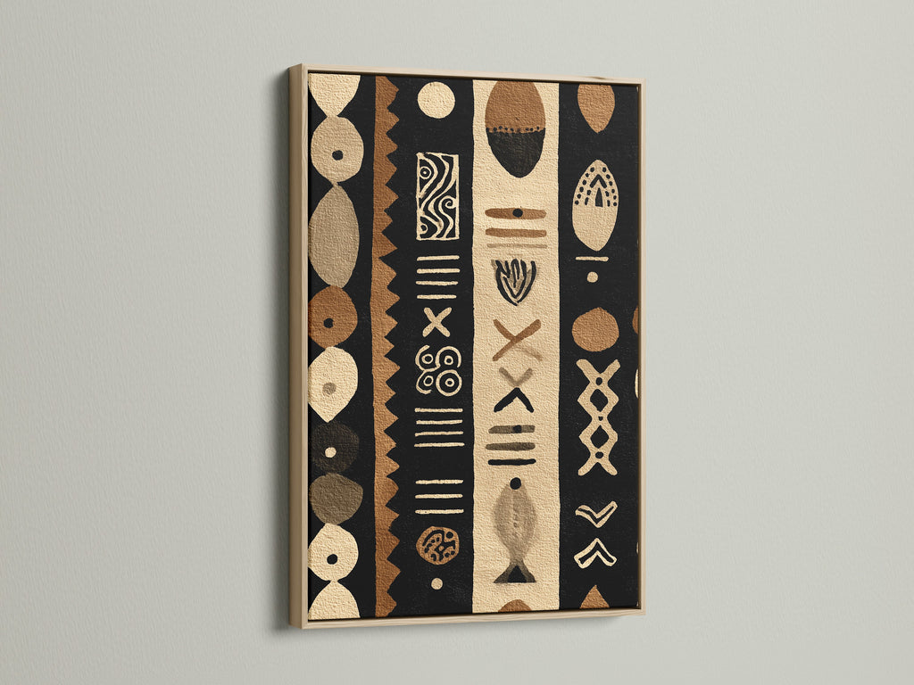 A captivating oak frame showcases a tribal artwork. The art features black brown and beige colors. The artwork is displayed against a white wall. The natural wood grain of the oak frame enhances the room's warmth.