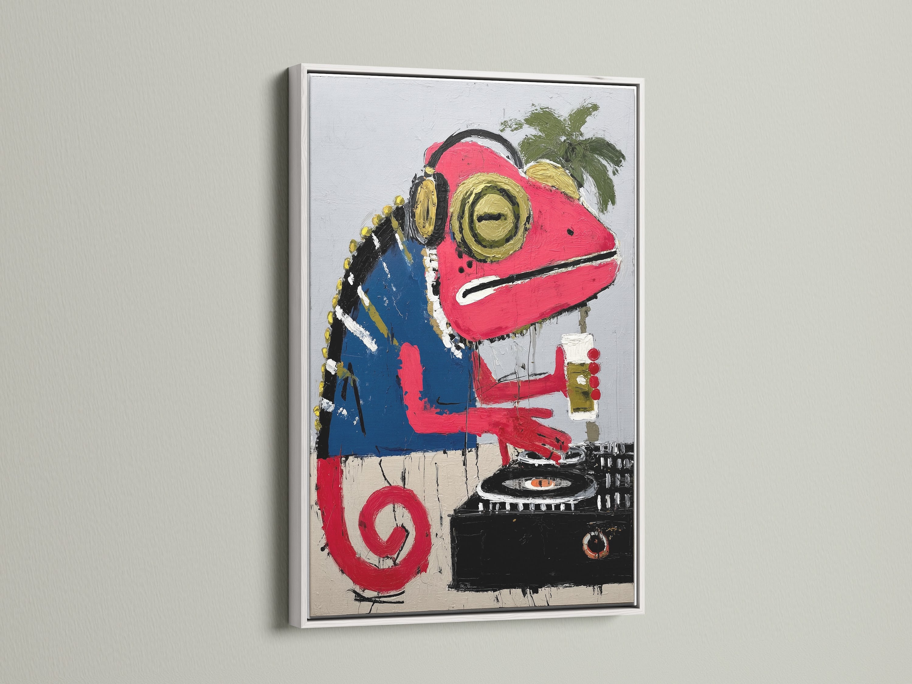 Iguana DJ canvas print in a white frame. Brighten your space with this tropical canvas. This artwork is ideal for home theaters or entertainment rooms. Modern and eclectic style.