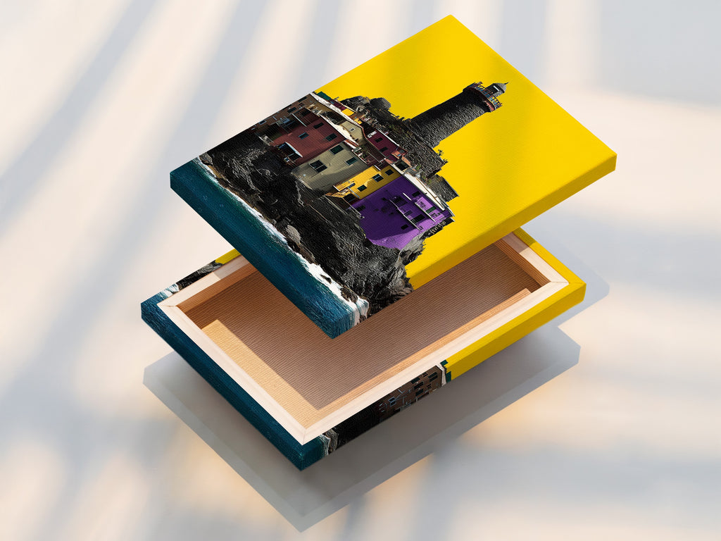 A stretched canvas print of a Coastal Lighthouse. The artwork showcases a village with a lighthouse. The stretched canvas is ready to hang. Perfect for adding a touch of Italian Riviera charm to your home or office decor.