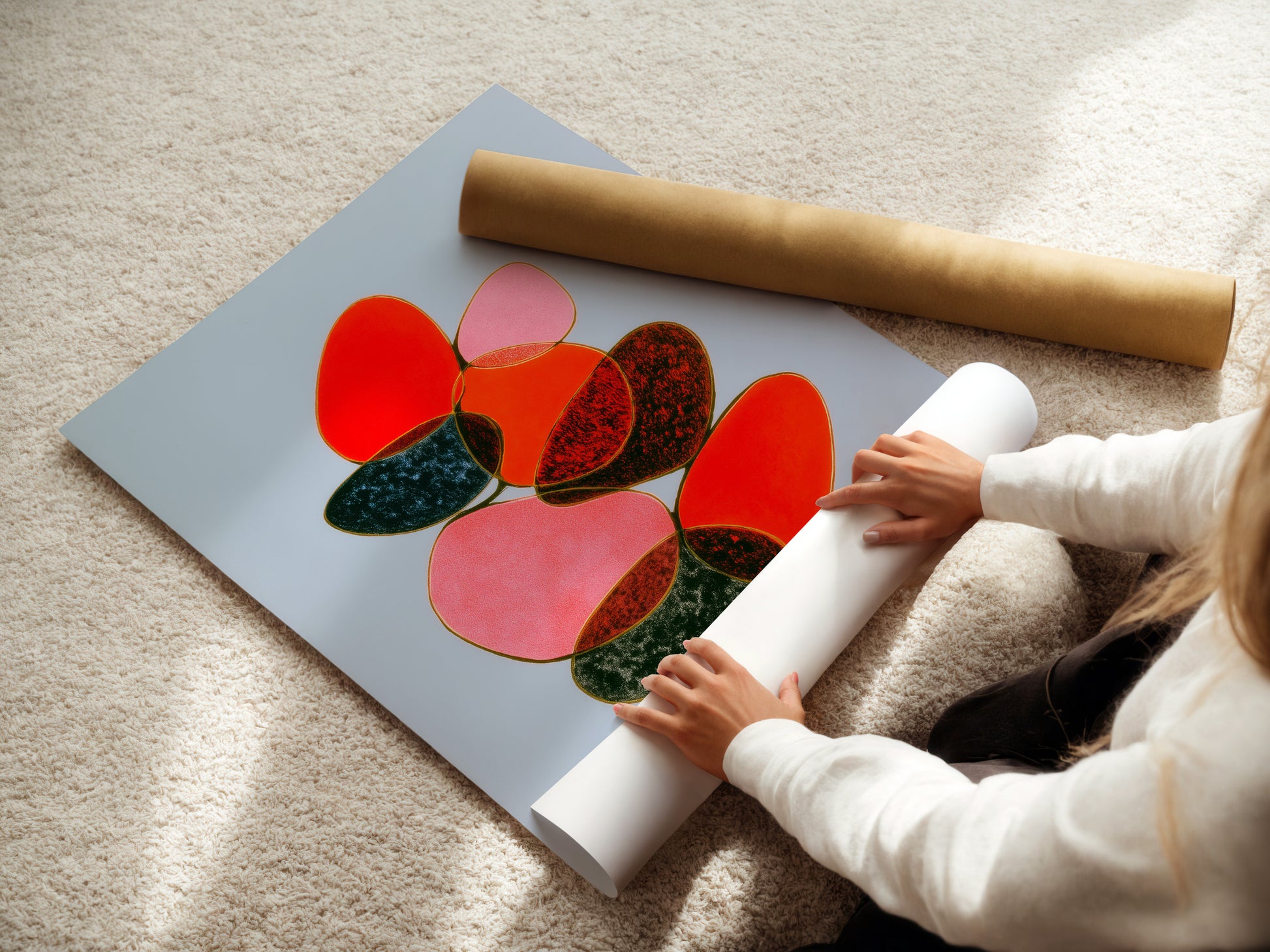 A woman carefully rolls a fine art poster paper. High-quality paper ensures the abstract artwork looks stunning. This balance art print is perfect for framing. Ideal for modern wall decor.