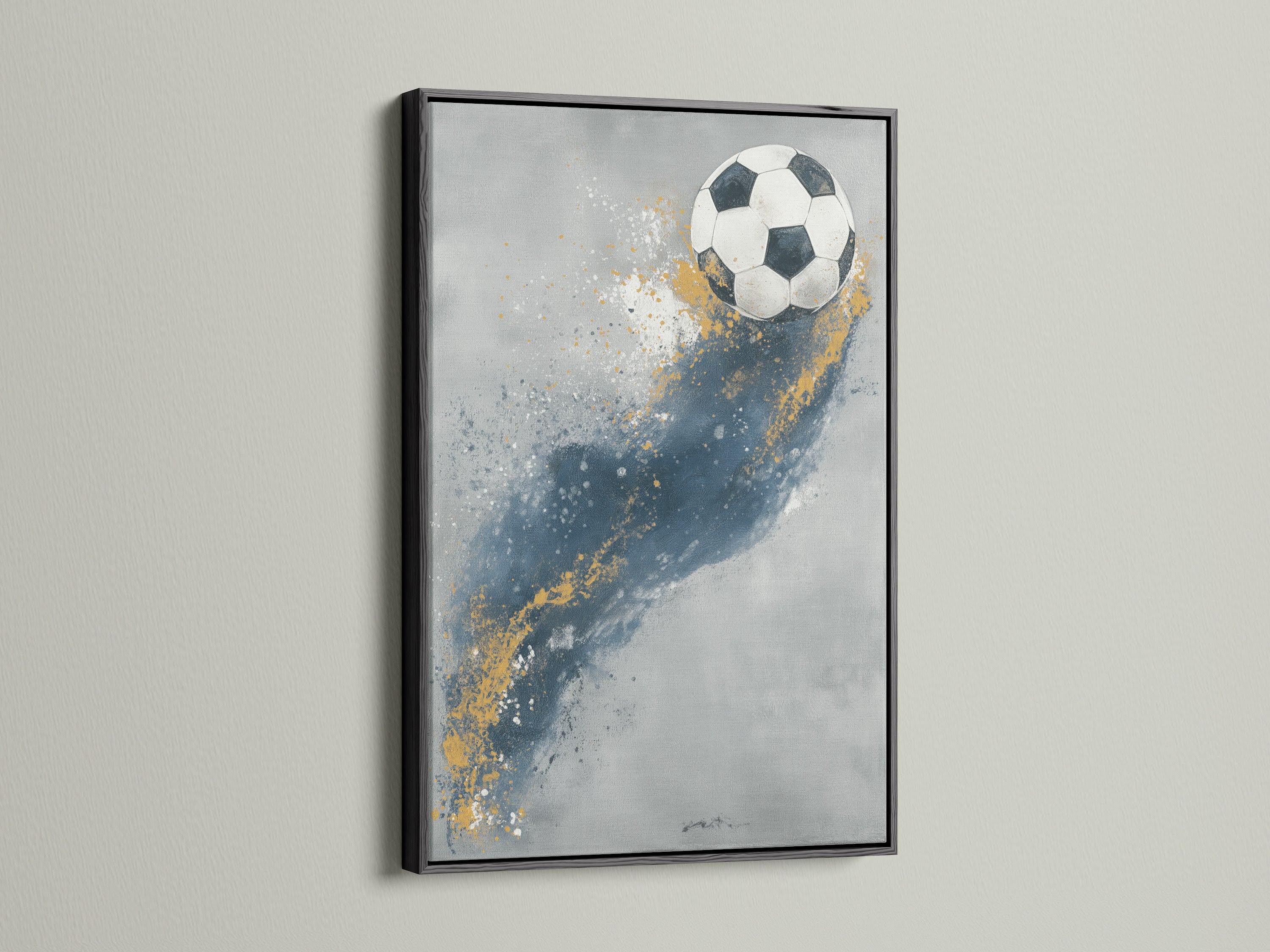 This sports canvas print is framed in black. This gives a sleek and modern look. The soccer ball artwork features blue and gold accents. Perfect for adding athletic decor to a boys room. It is also great for a game room. This print will elevate your wall decor.