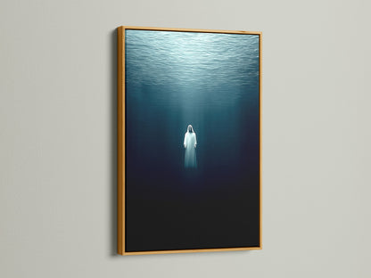A gold frame displays the underwater figure artwork. This ocean canvas art is ideal for modern spaces. Its blue tones bring a tranquil vibe to any room. The ethereal artwork is perfect for creating a calming atmosphere. Elevate your home decor with this spiritual art.