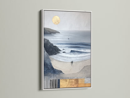 A white frame showcases a serene beach wall art. This ocean canvas adds calming artwork to any room. Its a versatile modern art print. The white frame highlights the blue gray art within.
