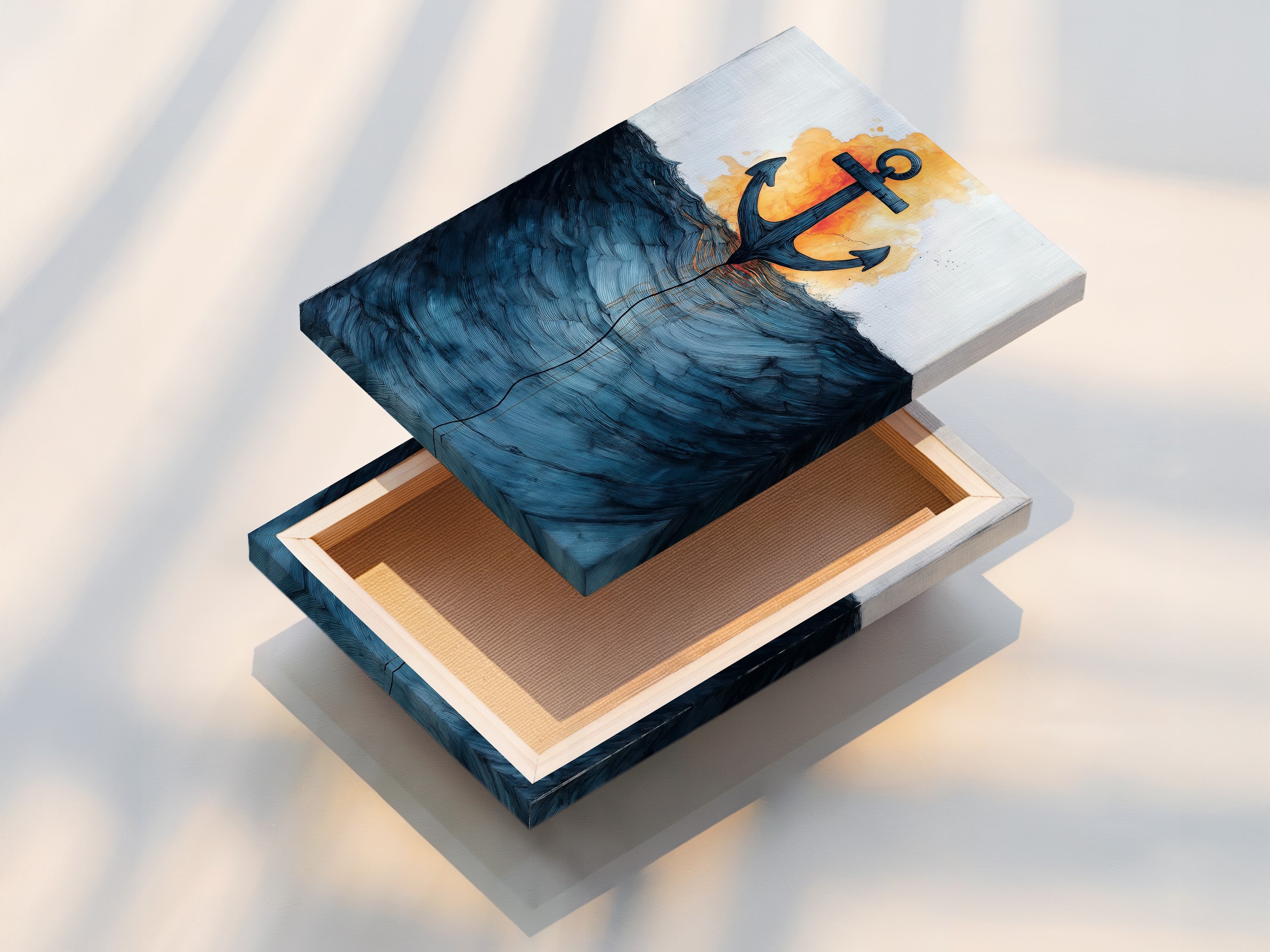 A stretched canvas print of nautical artwork. The art features an anchor and ocean waves. Ready to hang this stretched canvas adds instant coastal charm. Ideal for living rooms bathrooms and lake houses. Explore our ocean art.