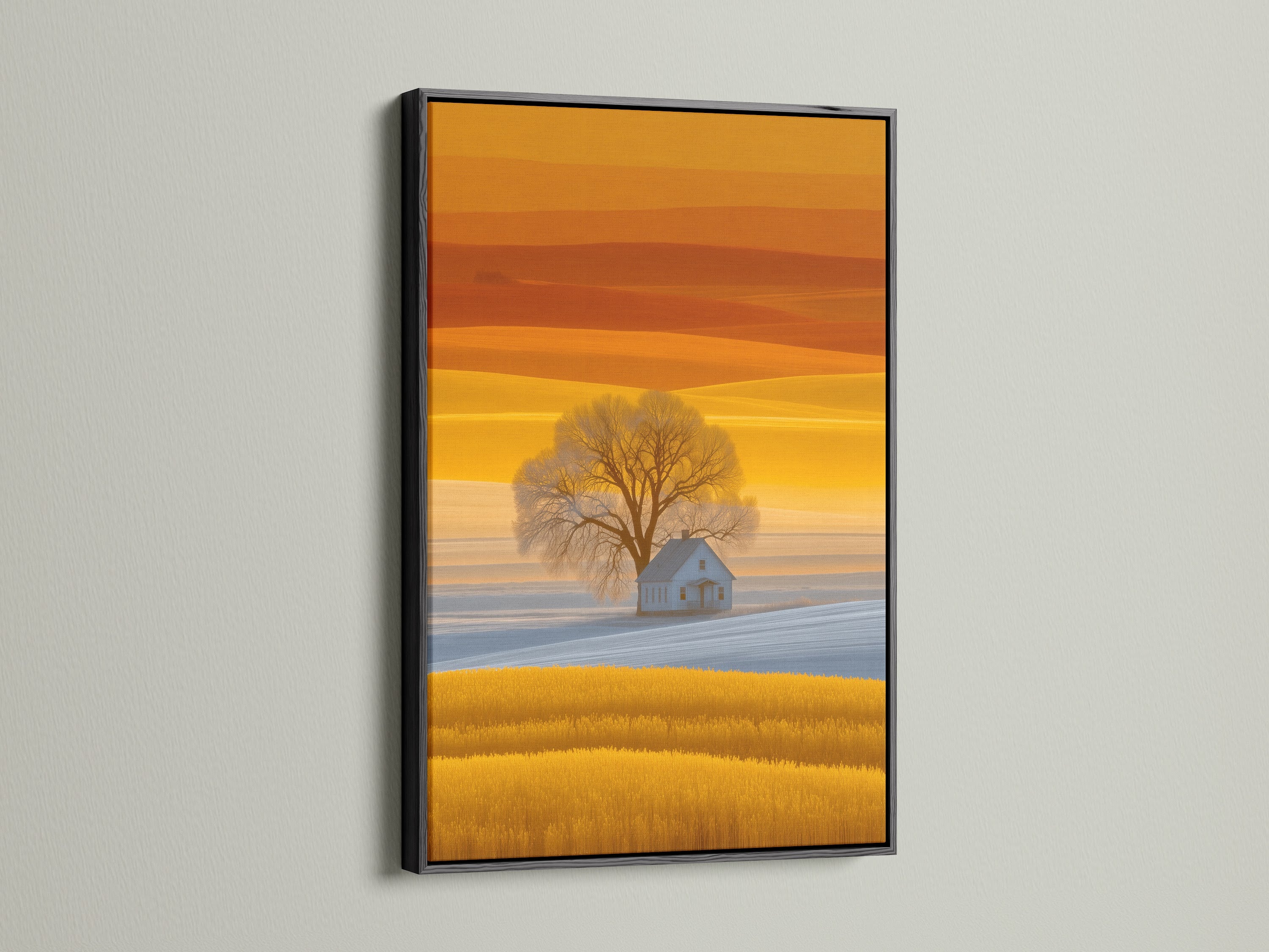 This is a black framed farmhouse landscape canvas artwork. The golden field wall art features a country house. This nature print provides rural wall art for your dining room decor. It's perfect for farmhouse decor. Add scenic artwork to your home.