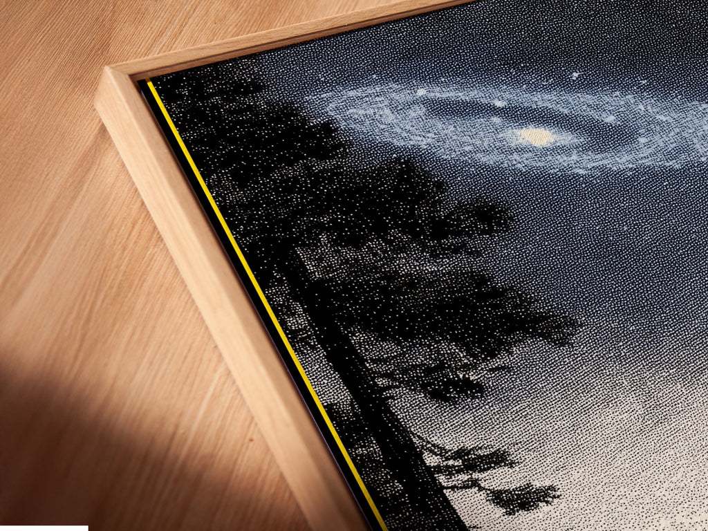 Angled close-up of a canvas print in a floating frame. The artwork shows a Night Sky Landscape. This galaxy and lake wall art adds depth. This celestial scenery print is ideal for modern homes. Unique framed art for any room.