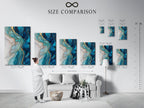 A size comparison chart is displayed in a modern interior. The chart showcases various sizes of blue abstract art prints. These prints feature fluid acrylic textures and gold accents. Find the perfect size for your living room bedroom or office. Discover elevated contemporary wall decor.
