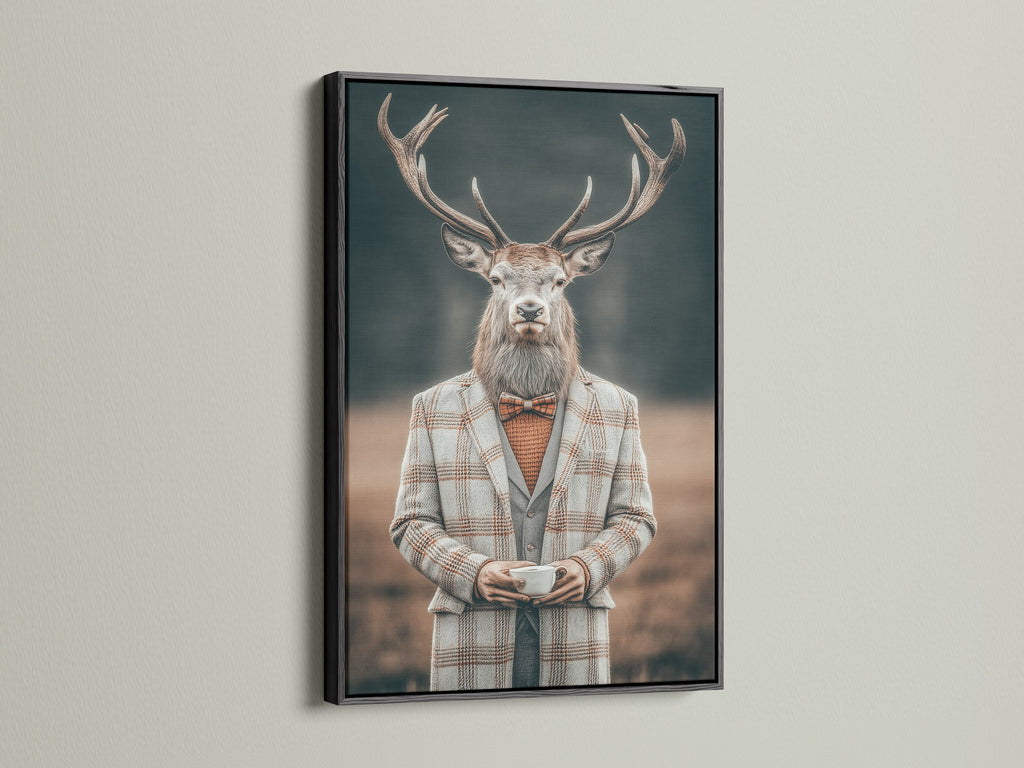 Gentleman Deer art print in a sleek black frame. This animal portrait art offers a vintage yet modern appeal. It is ideal for adding quirky decor to your office. The anthropomorphic artwork stands out. This is a great choice for business owners.
