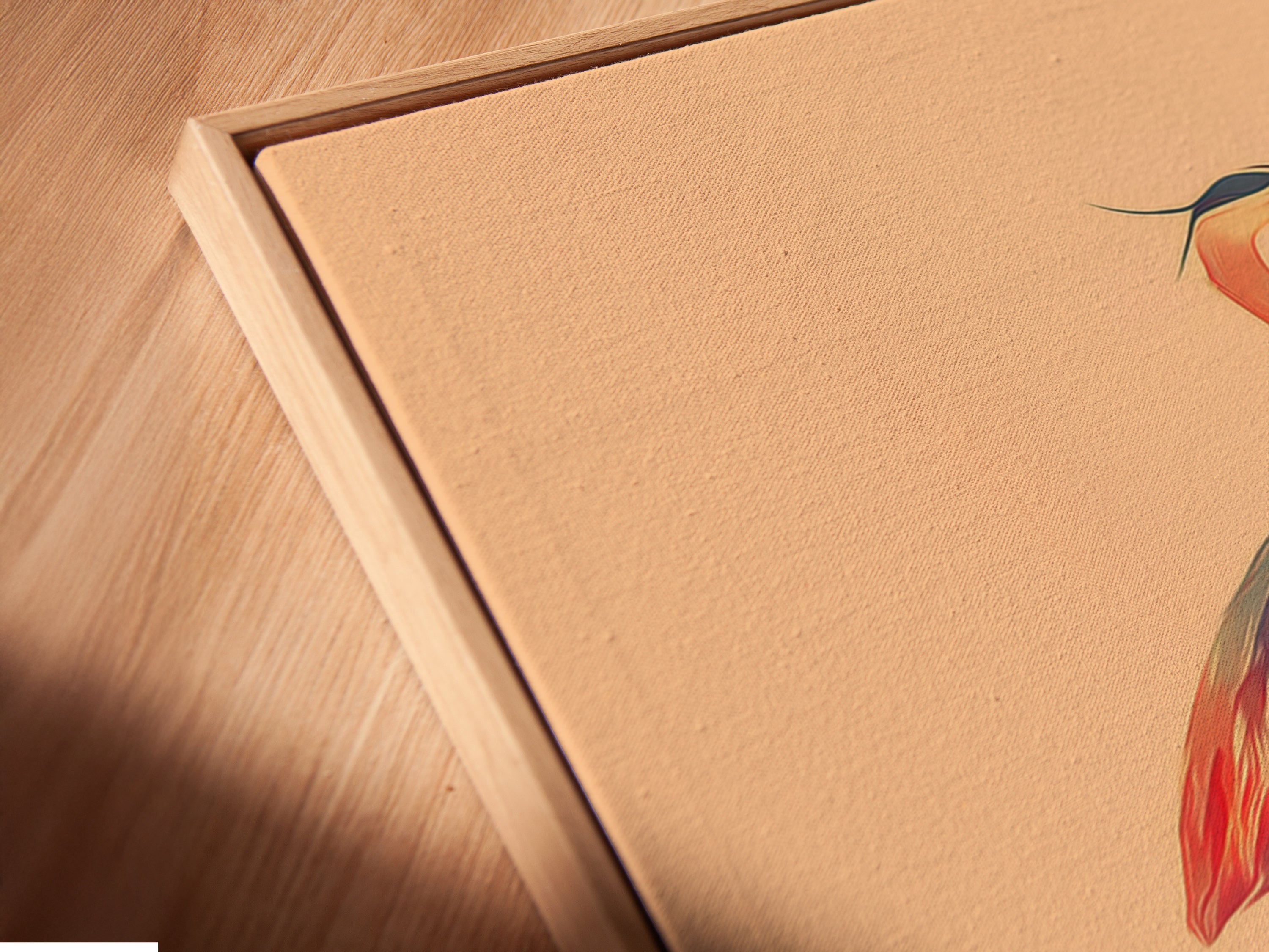 Close-up of a canvas print in a floating frame. The heron artwork is beautifully displayed. The modern minimalist artwork is ready to hang. This coastal bird wall art enhances any space. It is a serene and stylish piece.