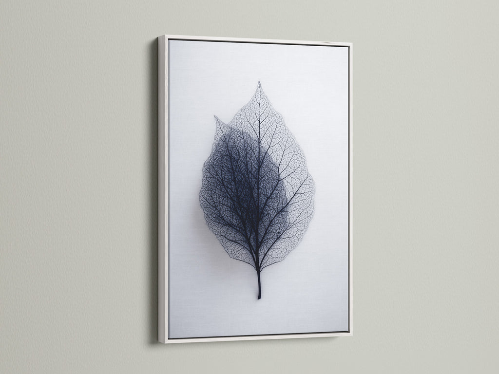 Leaf art is displayed in a white frame. The white frame creates a clean modern look. This frame highlights the intricate details of the artwork. A versatile choice for any room. Enhance your artwork with a white frame.