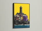 Coastal Lighthouse artwork in a black frame. This artwork captures a village on a cliff with a lighthouse. The black frame enhances the colorful details. Perfect for coastal or modern decor styles. A striking sea view print.