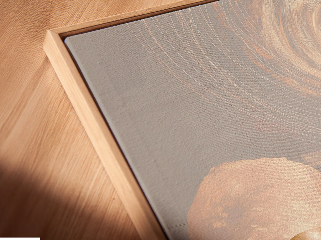A close-up of an Abstract Zen canvas print in a floating frame. The modern minimalist artwork appears to float adding a gallery touch. The neutral tones and balanced stone art create a calming effect. Ideal for homeowners renters and interior designers.