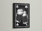 Framed artwork featuring a playing card beer mug art print. The artwork is framed in a black frame. The black frame adds a touch of sophistication. This makes the artwork pop. Ideal for a contemporary space.