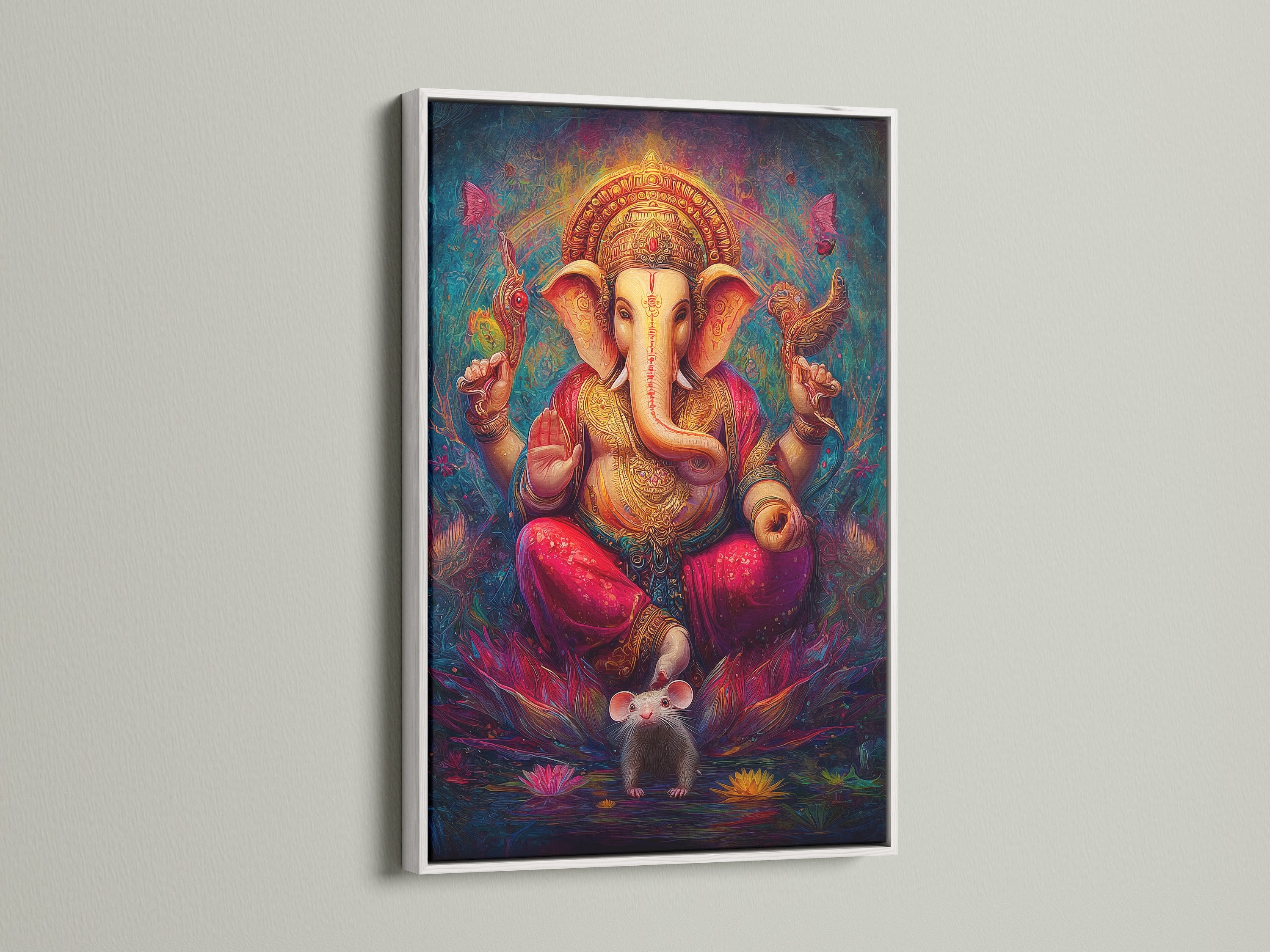 Ganesha Canvas Print in a white frame. This Hindu God canvas is a spiritual wall decor option. It is ideal for a bohemian art print in a meditation room. This sacred artwork features an elephant god print. The colorful spiritual art enhances any space.