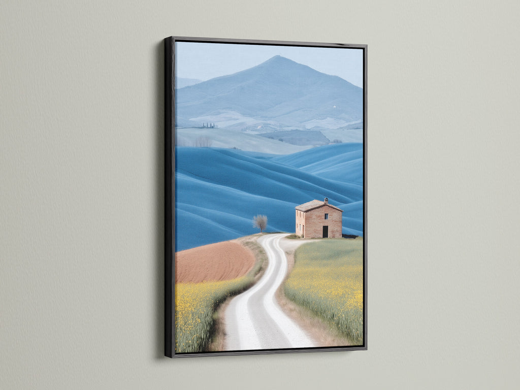 Tuscan Landscape canvas print in a black frame. The black frame adds a touch of sophistication to this farmhouse scenery photograph. The contrast enhances the rolling hills art. Perfect for creating a focal point in any room. This landscape canvas is a great addition to your wall art collection.