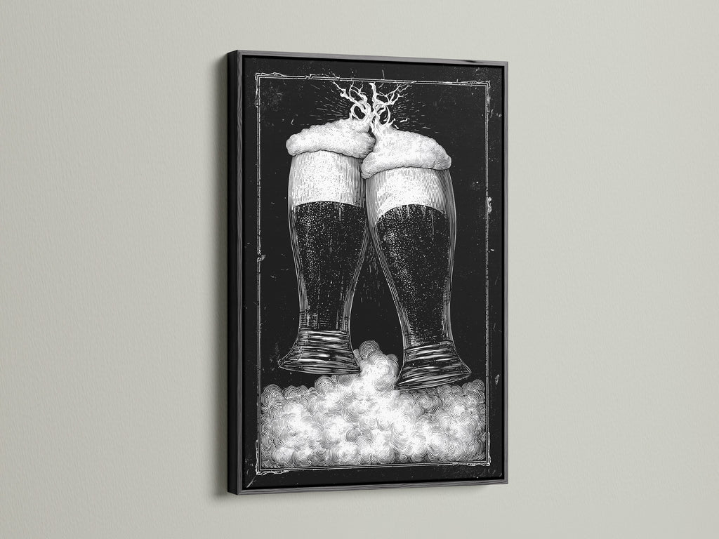 Black frame artwork. The art features two beer glasses in black and white tones. This piece is mounted on a clean white wall. The frame is a sleek black color. Discover framed artwork options to enhance your space. Explore our selection today for the perfect piece.