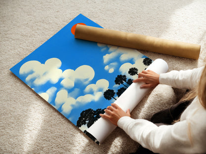 A woman is carefully rolling a fine art poster paper. The poster paper ensures a high-quality print. Ideal for creating stunning blue sky prints and retro pop art pieces for your home.