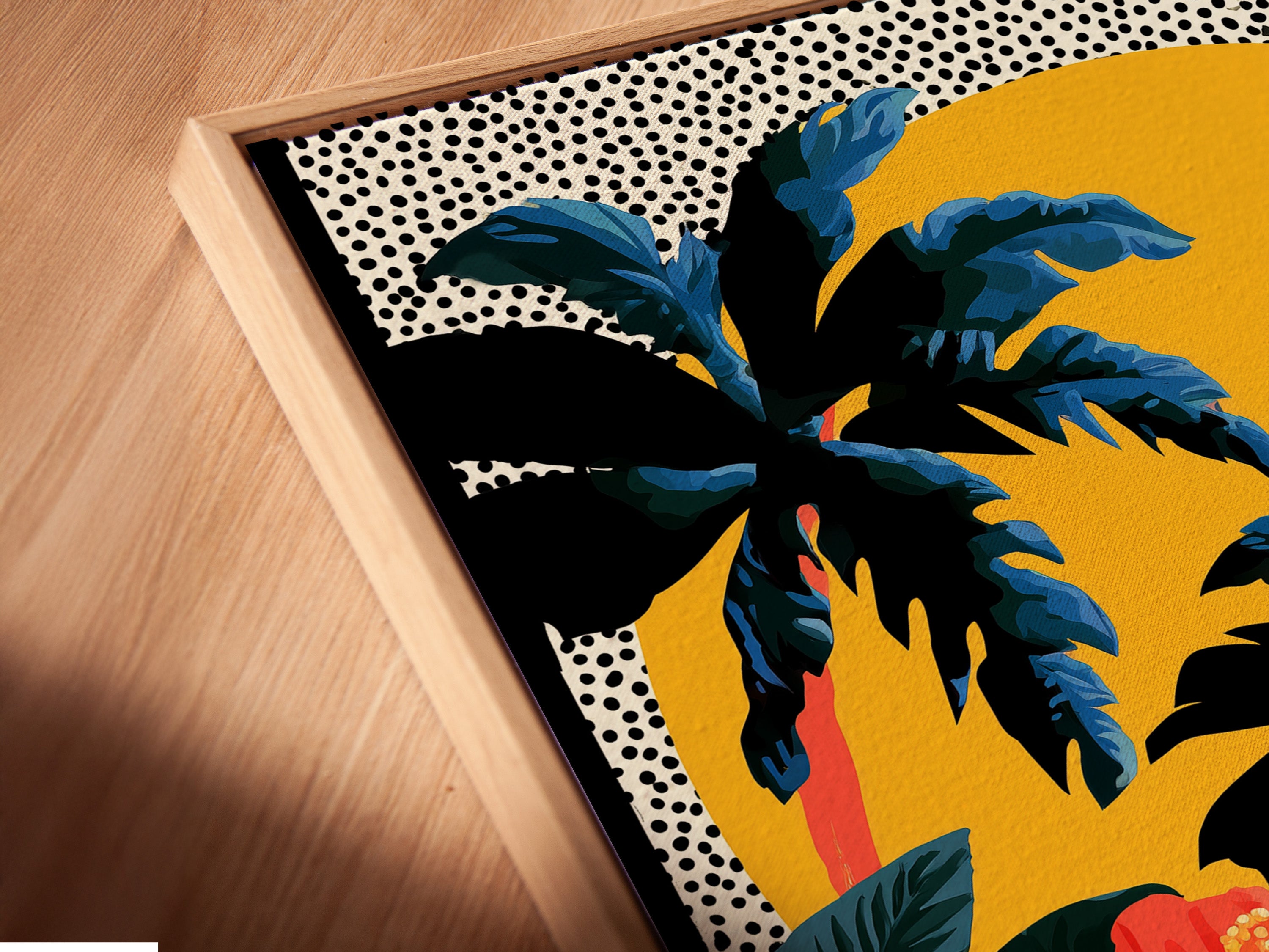 The image shows a close up of a canvas print in a floating frame. The artwork has palm trees hibiscus flowers and a sun against a dotted background. The floating frame adds a modern touch to the artwork. The artwork is mounted on a white wall.