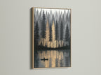 A serene forest lake artwork graces a wall with an oak frame. The golden hour reflection creates tranquil decor. Ideal as canoeing art this landscape print brings the outdoors in. This nature wall art is perfect for living room bedroom or office.