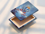 A stretched canvas print featuring Ganesha. This Hindu God artwork is ready to hang. The canvas brings spiritual peace to any room. Perfect for meditation rooms and yoga studios. The blue and gold colors enhance healing centers.