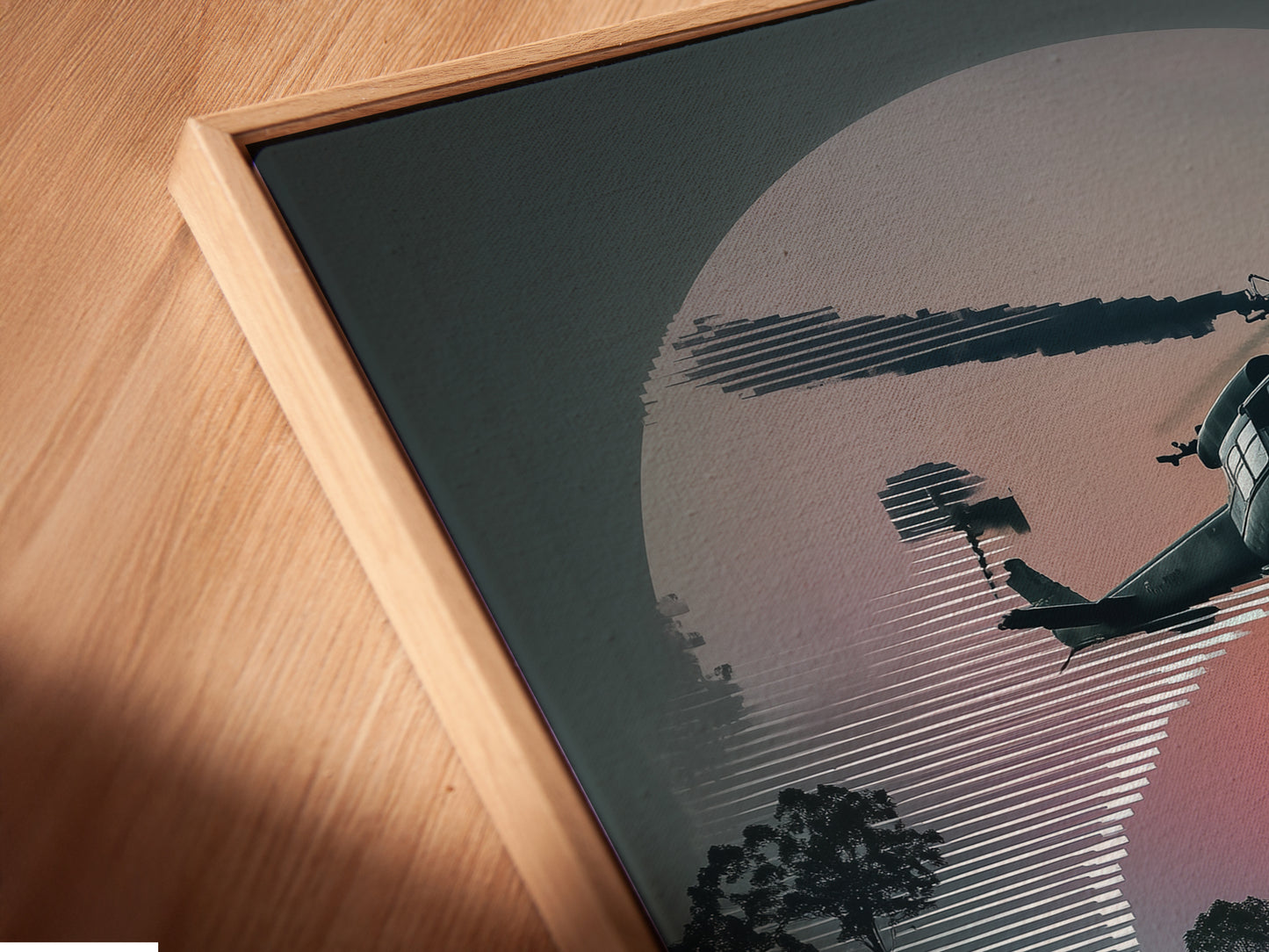 Close-up of a Vietnam War Era canvas print in a floating frame. The artwork depicts a helicopter with a sunset aviation background. This military aircraft print enhances any space with historical charm.