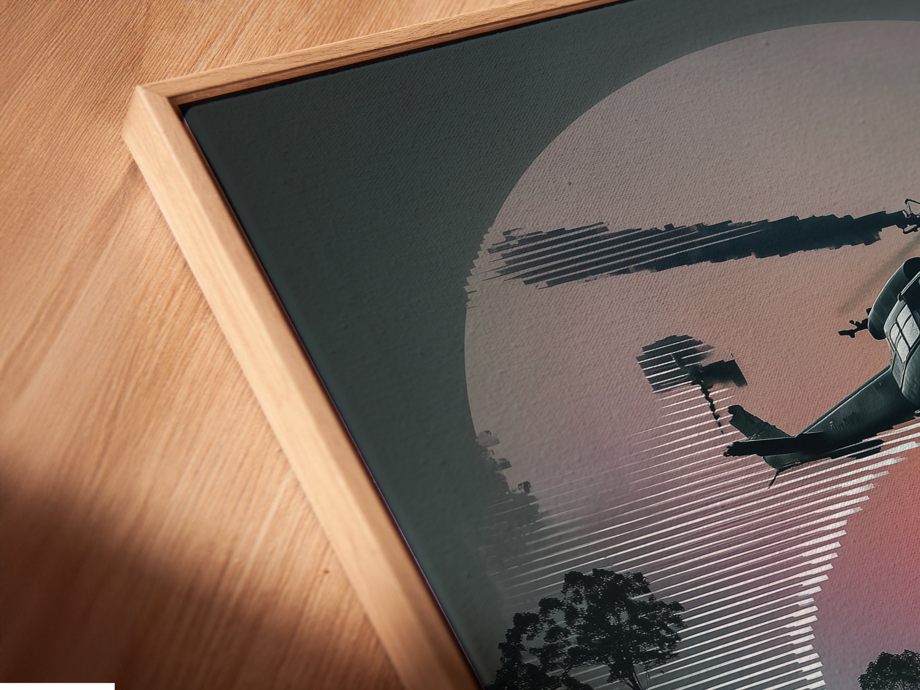 Close-up of a Vietnam War Era canvas print in a floating frame. The artwork depicts a helicopter with a sunset aviation background. This military aircraft print enhances any space with historical charm.