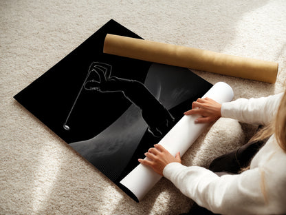 A woman carefully rolls a fine art poster paper. This ensures the golf swing print arrives in perfect condition. Choose fine art paper for a high-quality sports poster. It is ready to frame and display in your space.