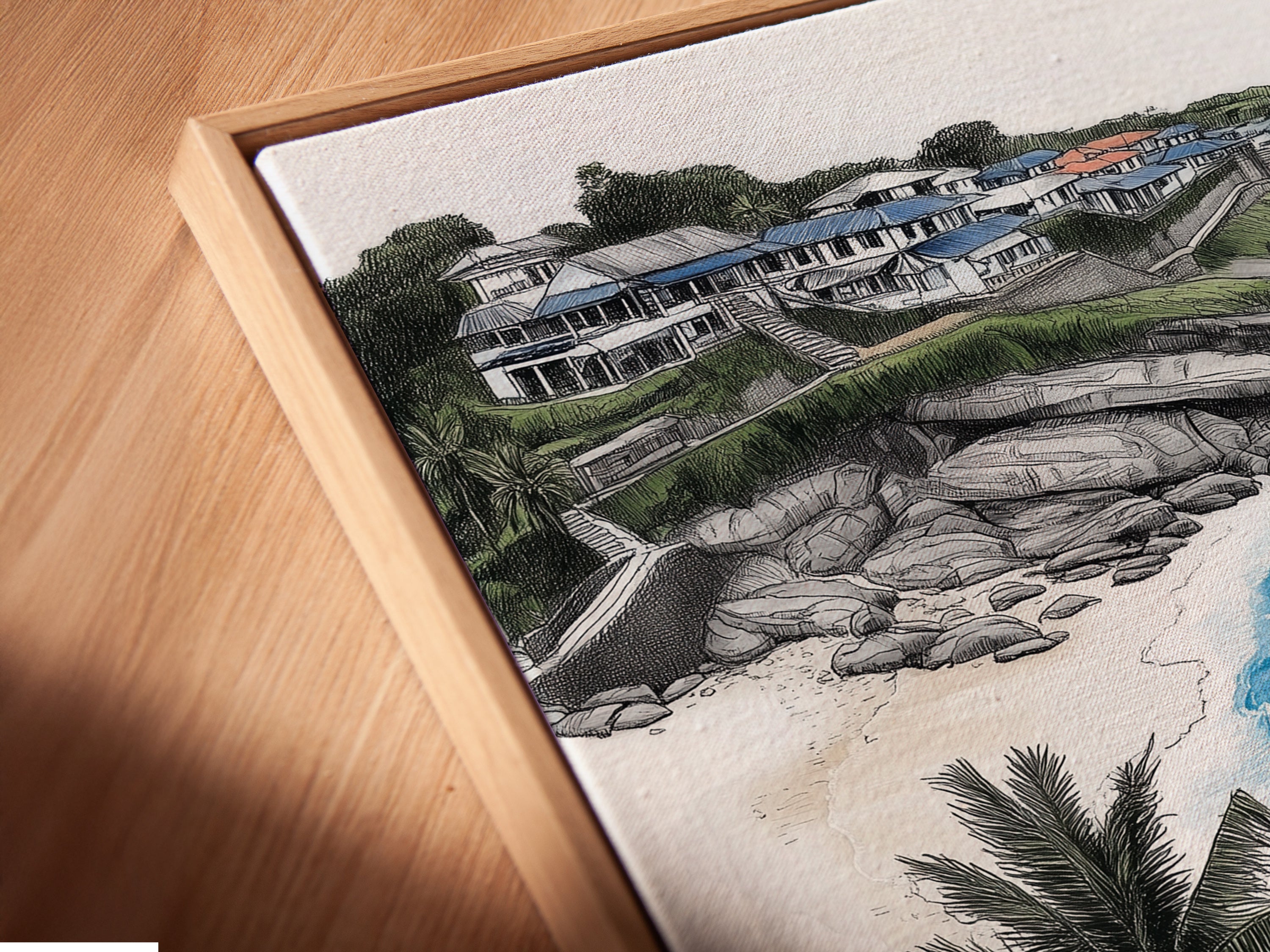 Angled close up of a canvas print in a floating frame. This coastal beach artwork brings a tropical ocean view indoors. The sailboat print is perfect for beach house decor. The floating frame enhances the sea view art. It's ideal for nautical wall art.