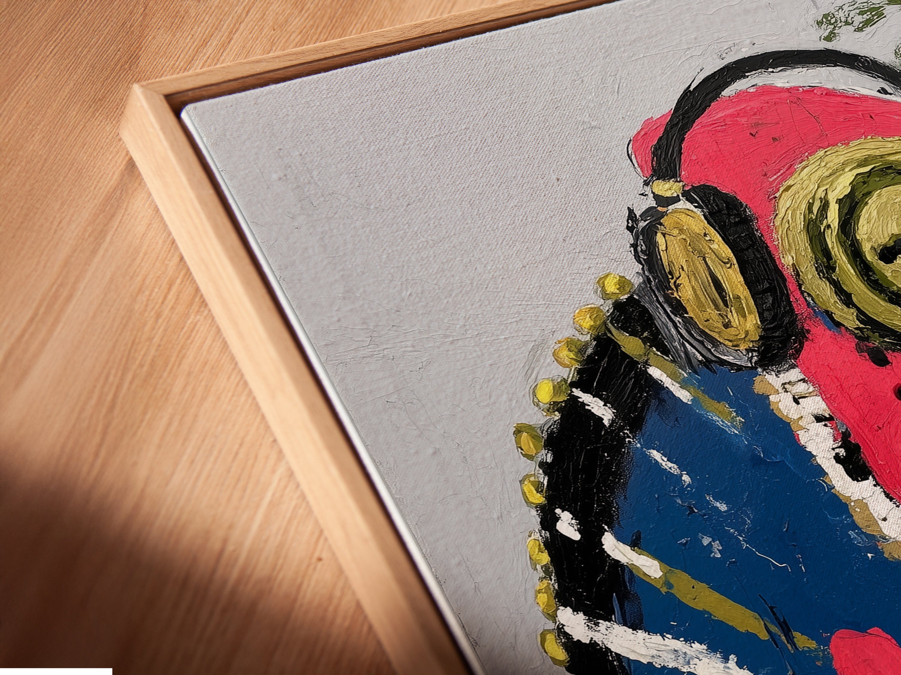 Close-up angled view of the Iguana DJ canvas print in a floating frame. The contemporary style of the artwork enhances any space. The floating frame adds a modern touch.